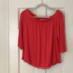 Women's Red Off-Shoulder Top, with Pom Pom fringe and slit on back of sleeves.